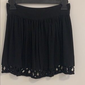 NWOT black skirt with cutout bottom